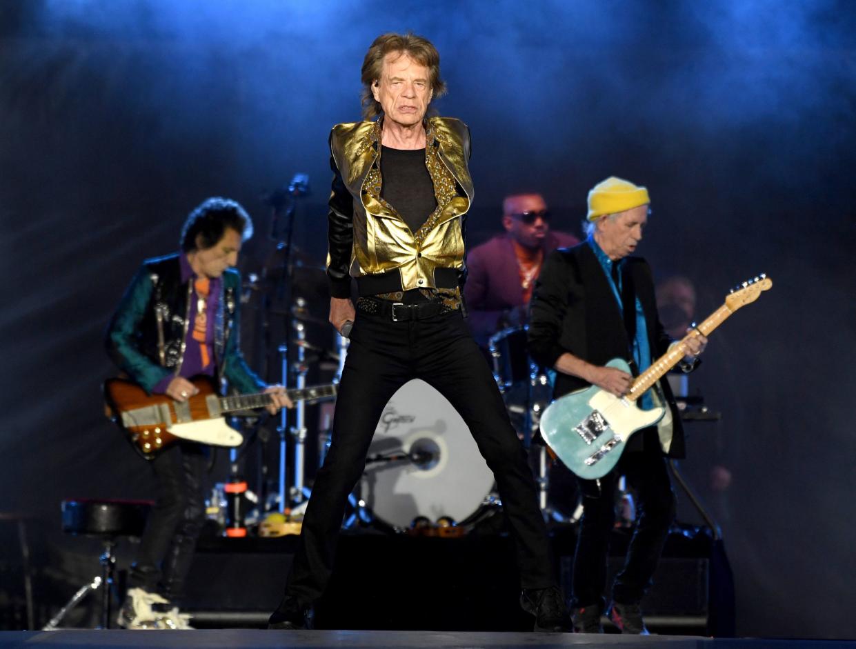 Ronnie Wood, Steve Jordan, Mick Jagger and Keith Richards perform onstage during The Rolling Stones 'No Filter' tour at SoFi Stadium on October 17, 2021 in Inglewood, California, Mick Jagger is in the foreground with the three other blurred behind him