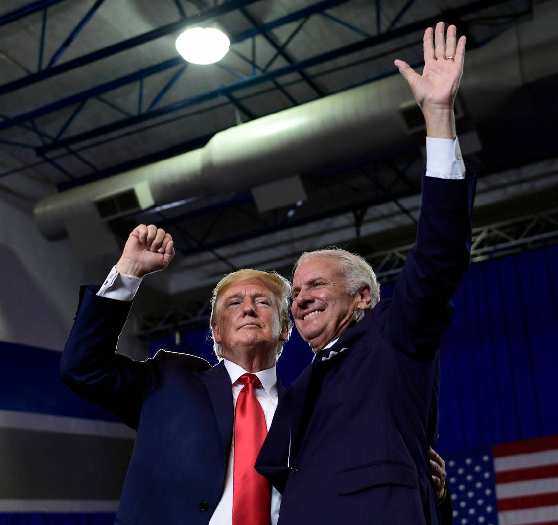 FILE - In this Monday, June 25, 2018 file photo, President Donald Trump speaks during a rally at Airport High School in West Columbia, S.C. for Republican Gov. Henry McMaster, right. Former President Donald Trump on Friday, March 5, 2021 endorsed South Carolina Gov. Henry McMaster’s bid for a second full term in 2022, continuing their yearslong alliance in a move to strengthen ties with the early-voting state that Trump won twice. (AP Photo/Susan Walsh, File)