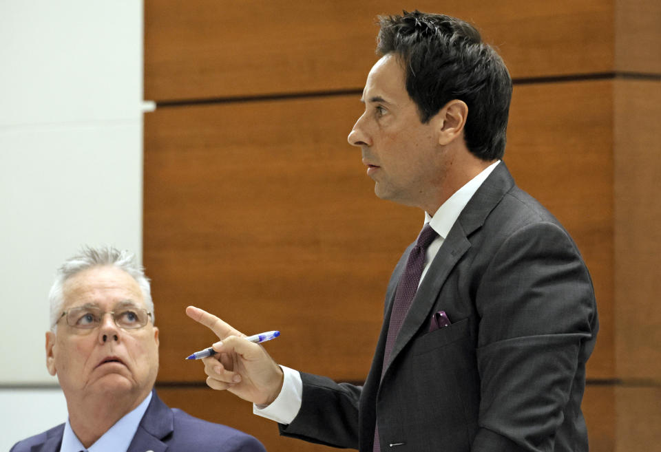 Defense attorney Mark Eiglarsh makes an objection during the trial of his client, former Marjory Stoneman Douglas High School School Resource Officer Scot Peterson, left, at the Broward County Courthouse in Fort Lauderdale, Fla., on Wednesday, June 21, 2023. Broward County prosecutors charged Peterson, a former Broward Sheriff's Office deputy, with criminal charges for failing to enter the 1200 Building at the school and confront the shooter. (Amy Beth Bennett/South Florida Sun-Sentinel via AP, Pool)