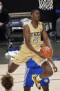 Georgia Tech forward Moses Wright (5) scores against Kentucky during the first half of an NCAA college basketball game Sunday, Dec. 6, 2020, in Atlanta. (AP Photo/John Bazemore)