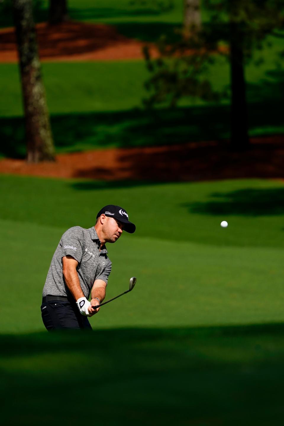 Apr 7, 2022; Augusta, Georgia, USA; Brian Harman chips onto the no. 7 green during the first round of The Masters golf tournament at Augusta National Golf Club. Mandatory Credit: Andrew Davis Tucker-Augusta Chronicle/USA TODAY Sports