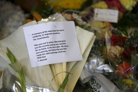 Flowers left by members of the public are seen at the Mater Dei Hospital mortuary where the bodies of 24 migrants lie in Tal-Qroqq, outside Valletta, April 22, 2015. REUTERS/Darrin Zammit Lupi