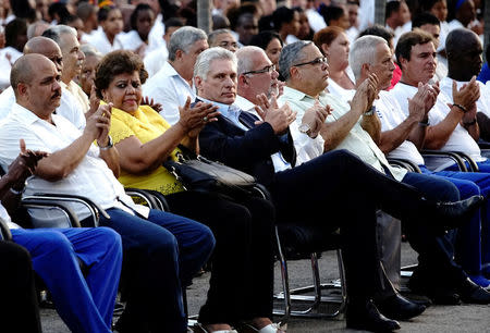 FILE PHOTO: Cuban President Miguel Diaz-Canel (3rd L) reacts during a ceremony to inaugurate the Cuban Sports Hall in Havana, Cuba, July 13, 2018. REUTERS/Alexandre Meneghini/File Photo