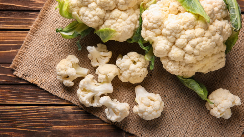 fresh cauliflower on burlap mat