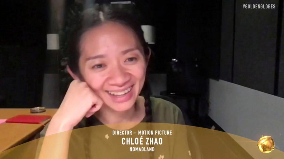 <p>In this video grab issued by NBC, Chloe Zhao accepts the award for best director</p> (AP)