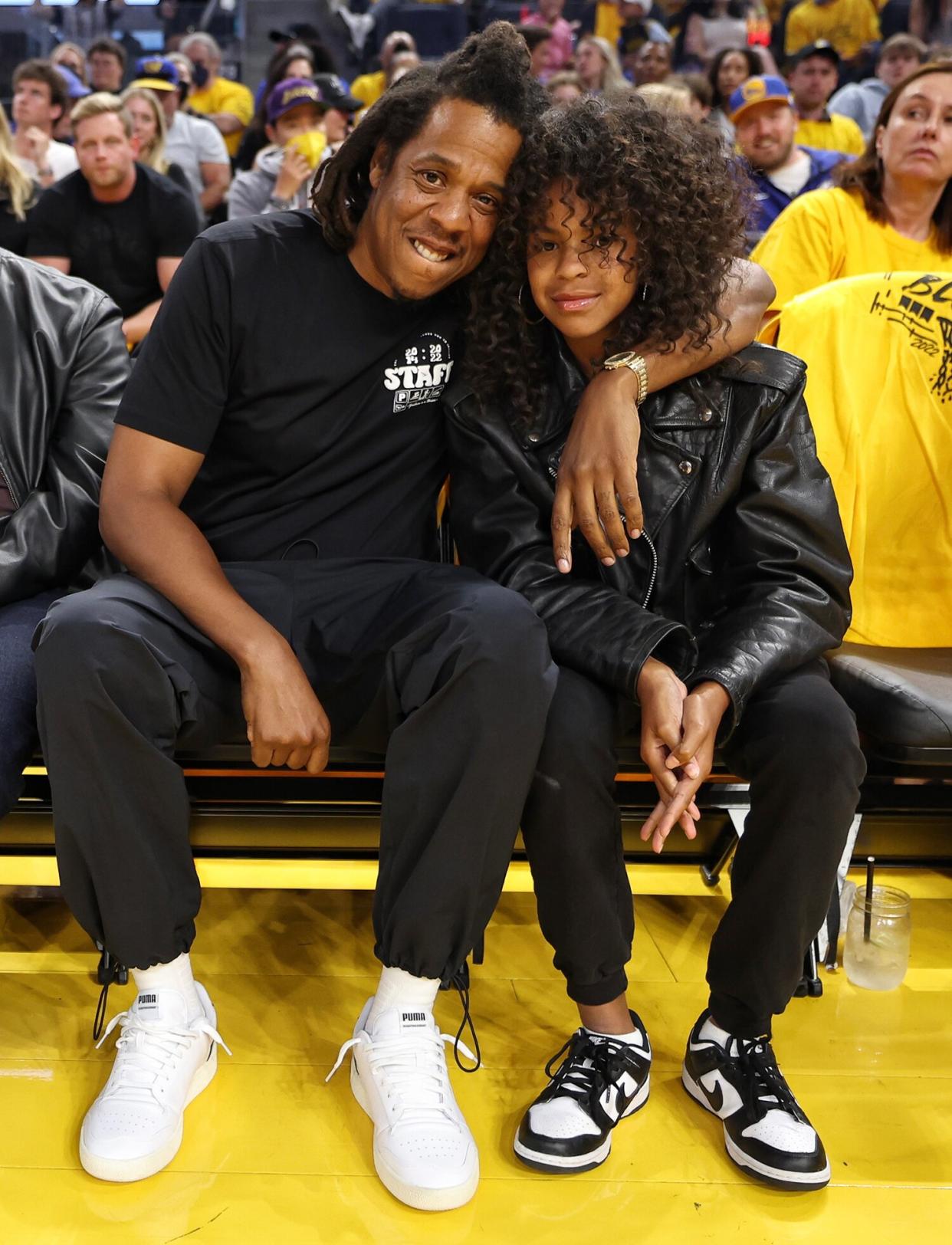 Jay-Z and his daughter Blue Ivy Carter poses for a photo in the game of the Boston Celtics against the Golden State Warriors