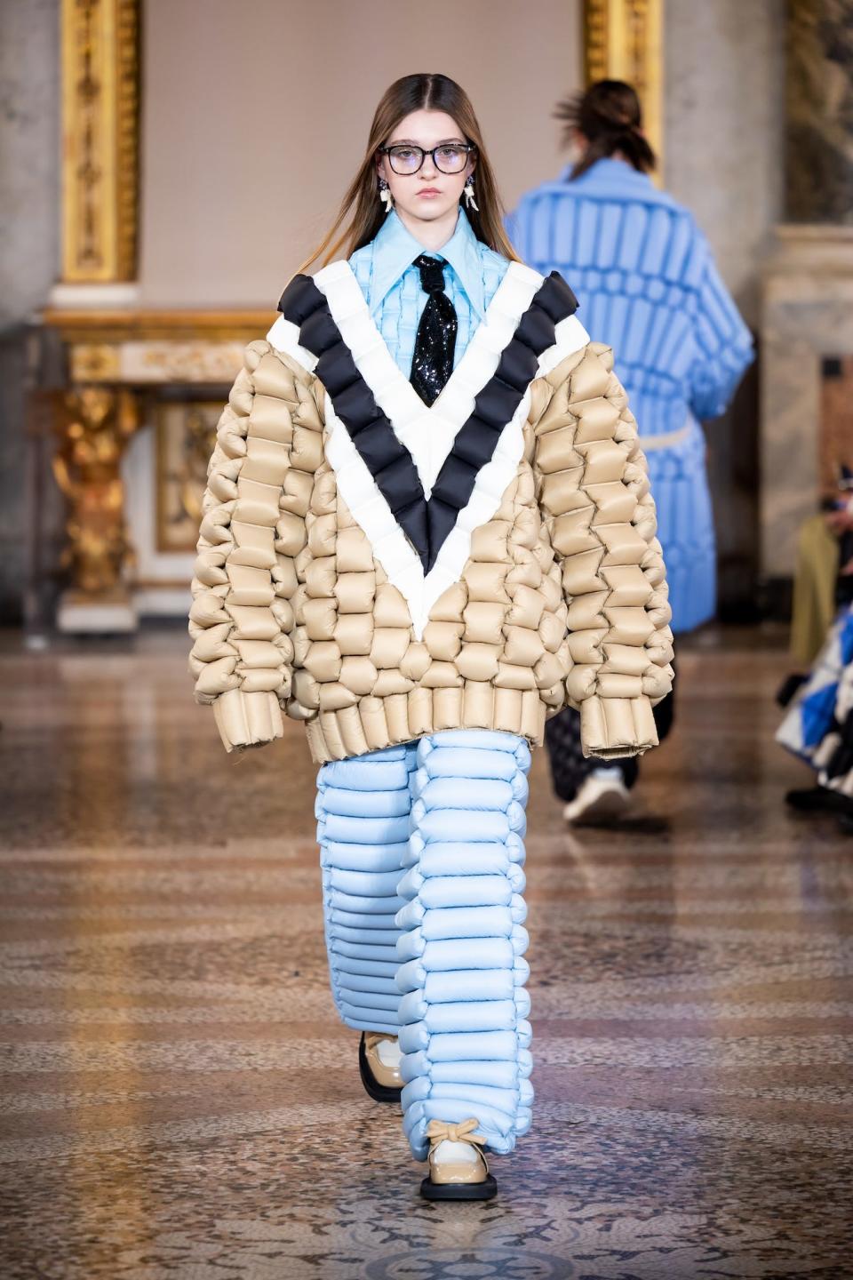 A model walks the Raxxy runway during Milan Fashion Week.