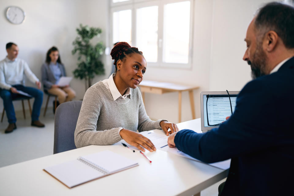 young Black woman interviewing for a job