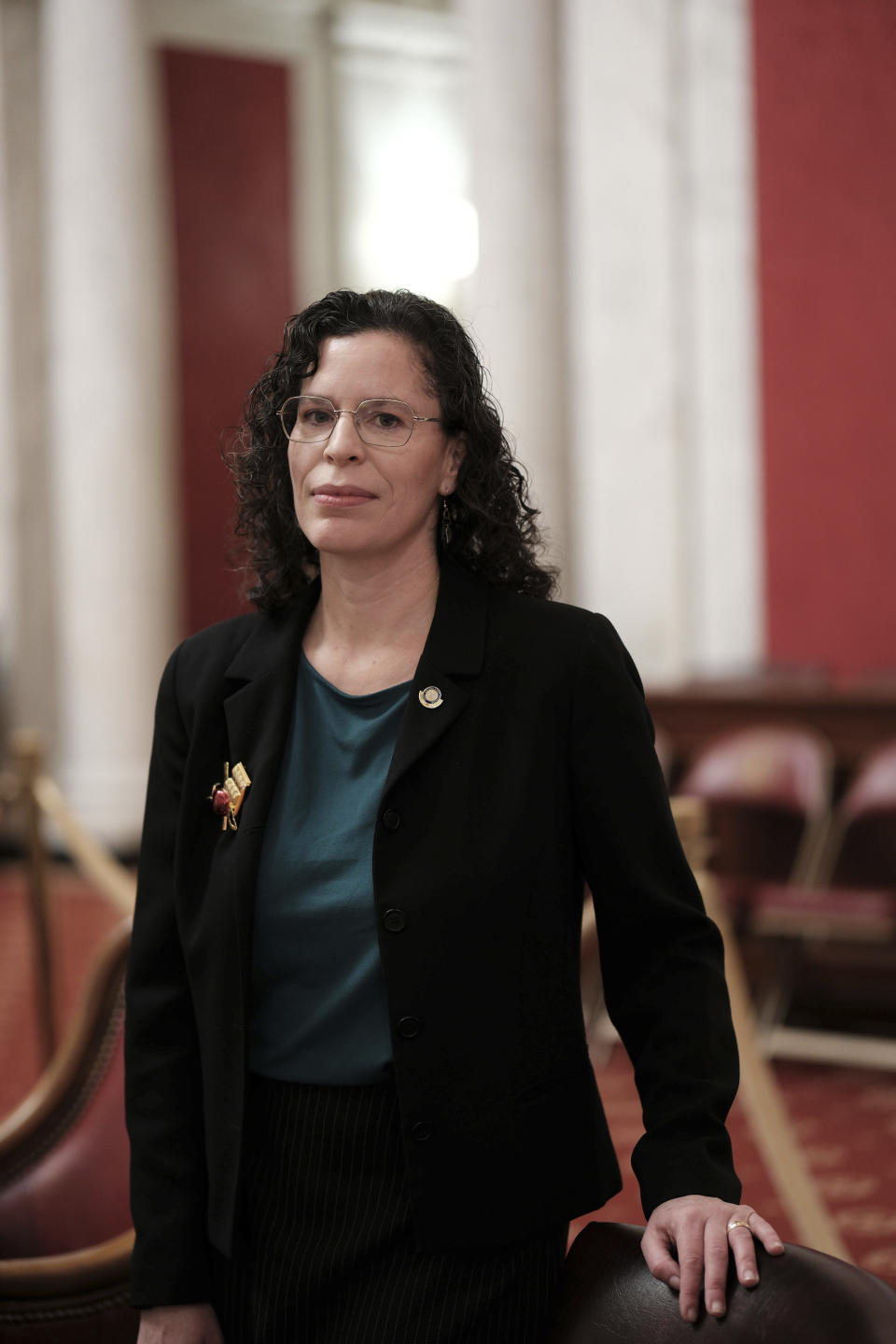 West Virginia state Sen. Patricia Rucker, R-Jefferson, stands at her desk in the Senate Chamber at the Capitol in Charleston, W.Va., on Wednesday, Jan. 25, 2024. West Virginia has the least amount of female state legislators.(AP Photo/Chris Jackson)