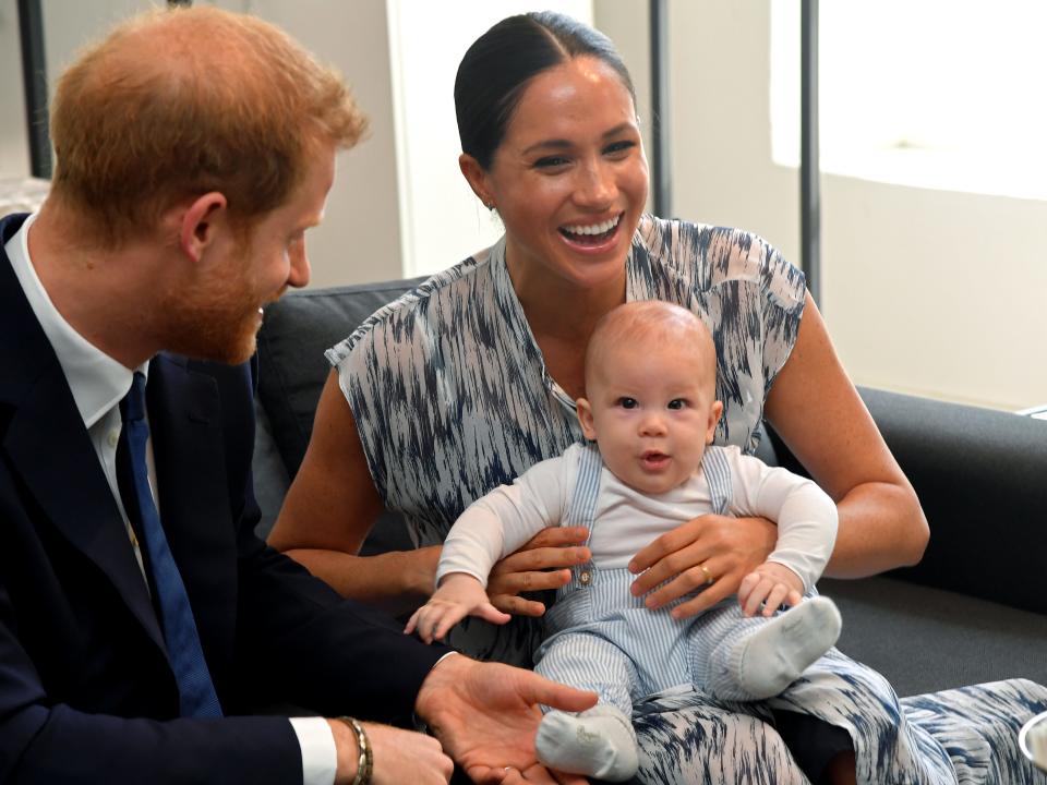 Prince Harry, Meghan Markle, and their son Archie Mountbatten-Windsor in South Africa in 2019.