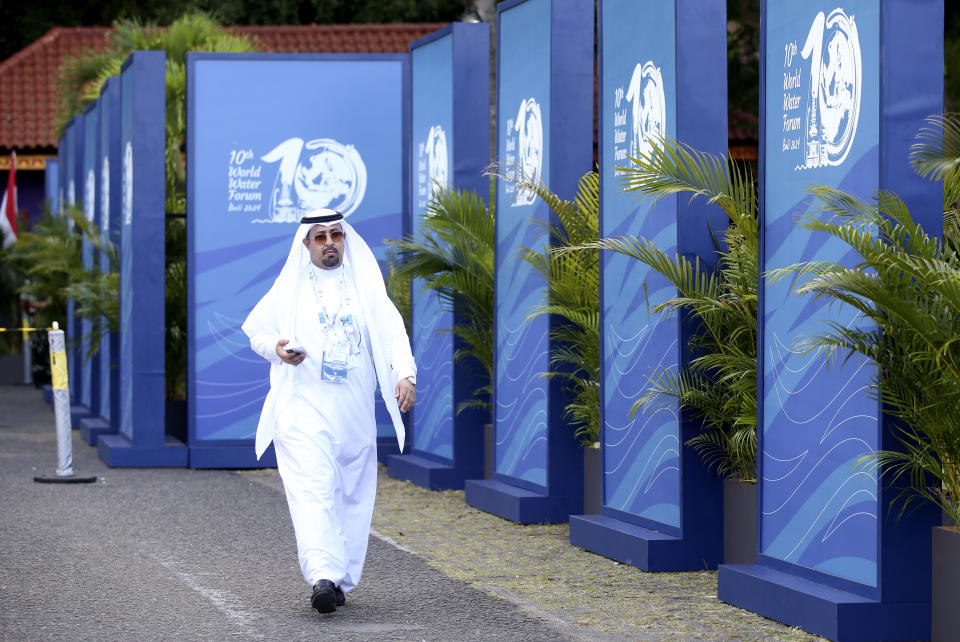 A participant walks at a venue of the 10th World Water Forum in Nusa Dua, Bali, Indonesia on Monday, May 20, 2024. (AP Photo/Firdia Lisnawati)