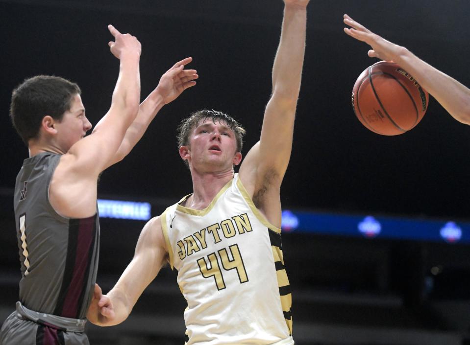 Jayton's Justin Collins, center, helps block a shot against Fayetteville in a boys Class 1A state semifinal, Thursday, March 7, 2024, at the Alamodome in San Antonio.