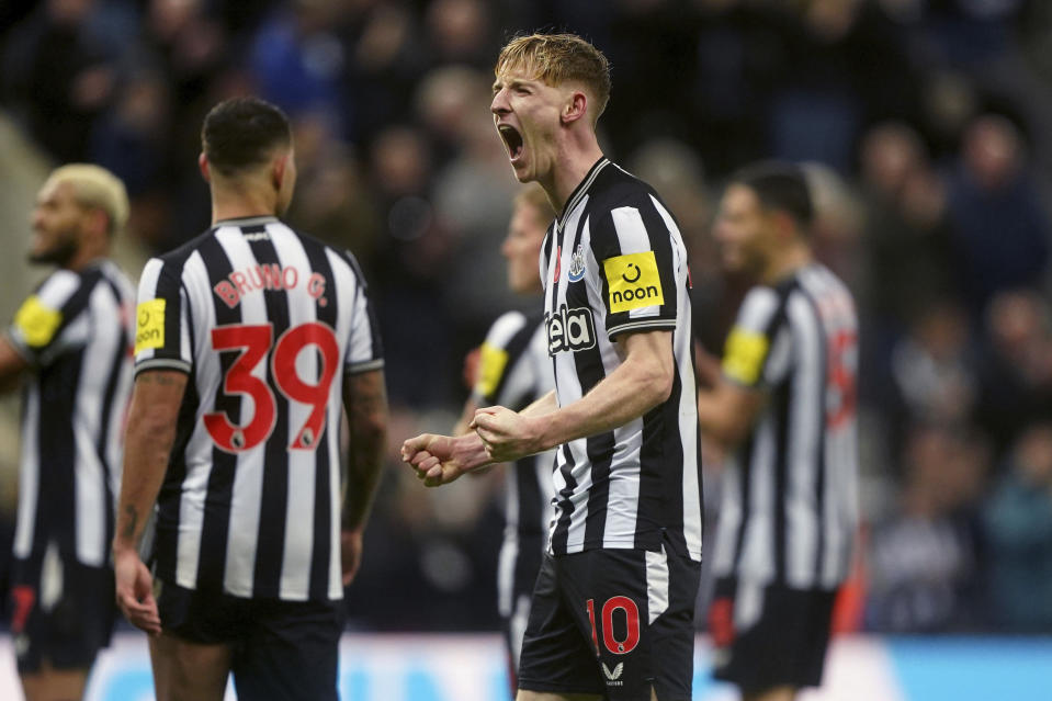 Newcastle United's Anthony Gordon celebrates following the English Premier League soccer match between Newcastle United and Arsenal at St. James' Park, in Newcastle upon Tyne, England, Saturday, Nov. 4, 2023. (Owen Humphreys/PA via AP)