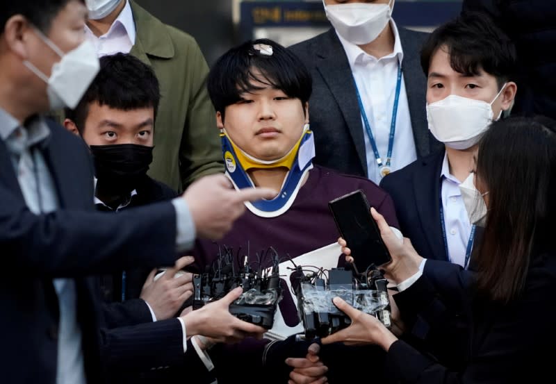 Cho Ju-bin, leader of South Korea's online sexual blackmail ring which is so called 'Nth room', walks out of a police station as he is transferred to a prosecutor's office in Seoul