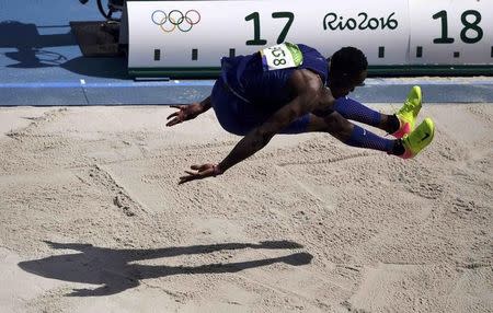 Will Claye during the triple jump. (Reuters)