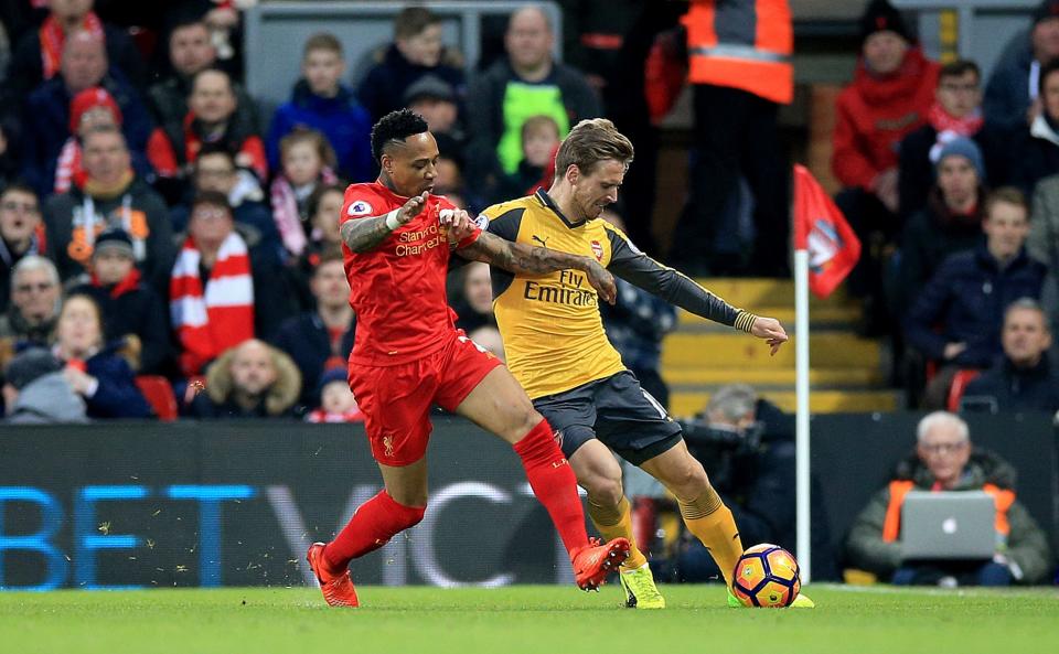 Liverpool's Nathaniel Clyne (left) and Arsenal's Nacho Monreal battle for the ball