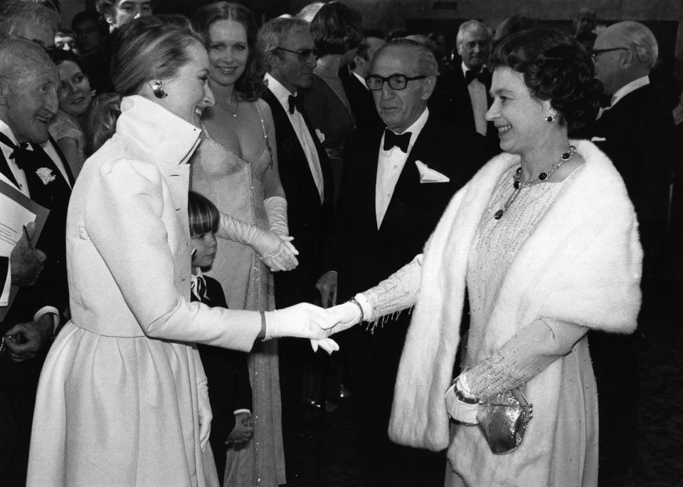 American actress, Meryl Streep meeting Queen Elizabeth II after a Royal Film Performance of 'Kramer vs Kramer' at the Odeon, Leicester Square, London.  Original Publication: People Disc - HO0297   (Photo by Graham Turner/Getty Images)