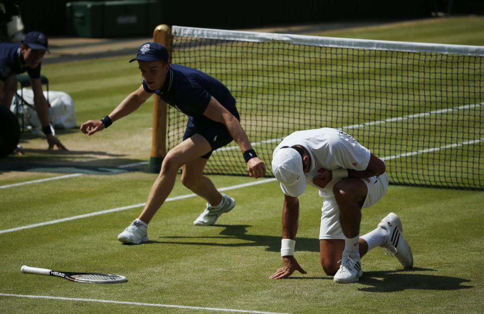 Serbia's Novak Djokovic reacts in his Men's Final against Great Britain's Andy Murray during day thirteen of the Wimbledon Championships at The All England Lawn Tennis and Croquet Club, Wimbledon.