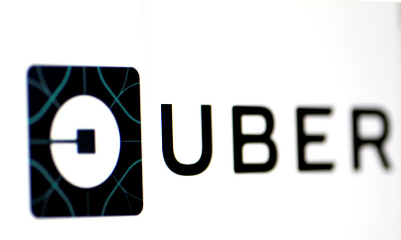 PHOTO: The Uber logo is seen on a screen in Singapore August 4, 2017. REUTERS/Thomas White