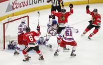 Nov 15, 2017; Chicago, IL, USA; Chicago Blackhawks center Artem Anisimov (15) celebrates after scoring a goal against New York Rangers goalie Henrik Lundqvist (30) during the third period at United Center. Kamil Krzaczynski-USA TODAY Sports