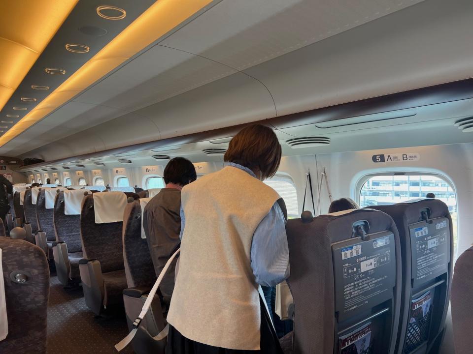 The quad-seating in the bullet train.