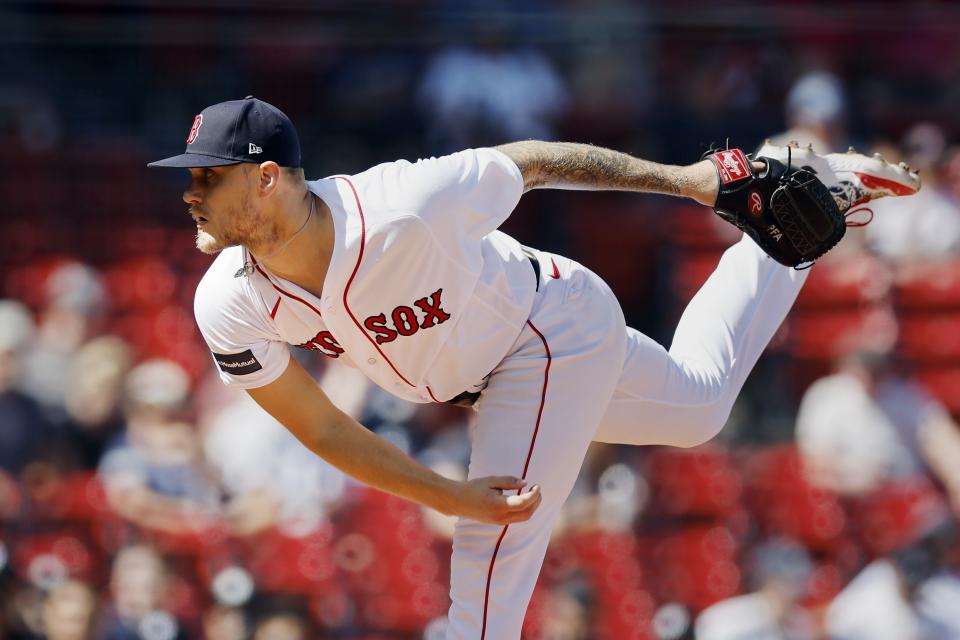 Boston Red Sox starting pitcher Tanner Houck throws against the New York Yankees in the first inning during the first game of a baseball doubleheader in Boston, Thursday, Sept. 14, 2023,. (AP Photo/Michael Dwyer)