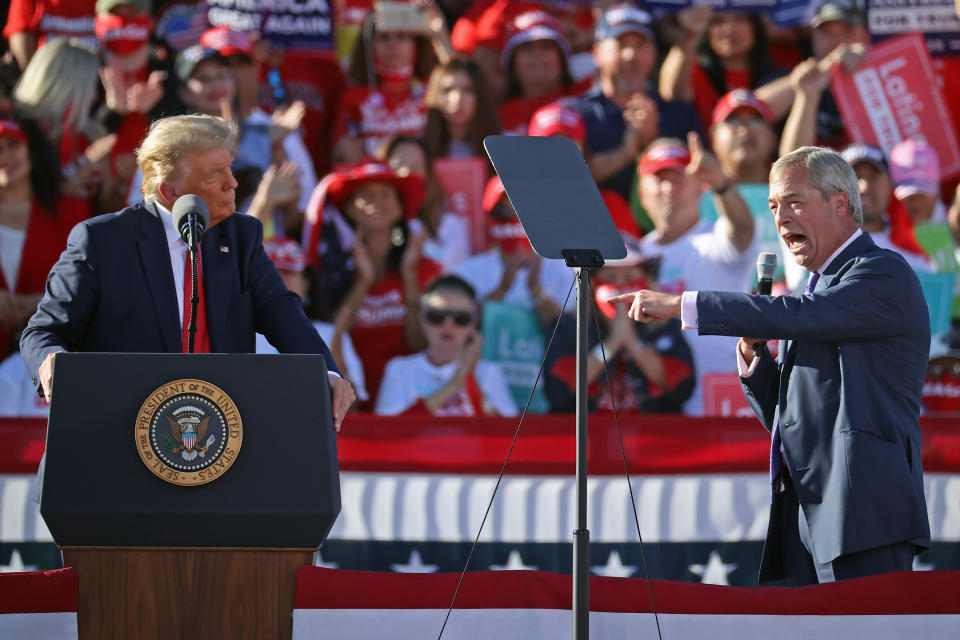 GOODYEAR, ARIZONA - OCTOBER 28: British politician Nigel Farage (R) praises U.S. President Donald Trump during a campaign rally at Phoenix Goodyear Airport October 28, 2020 in Goodyear, Arizona. With less than a week until Election Day, Trump and his opponent, Democratic presidential nominee Joe Biden, are campaigning across the country. (Photo by Chip Somodevilla/Getty Images)