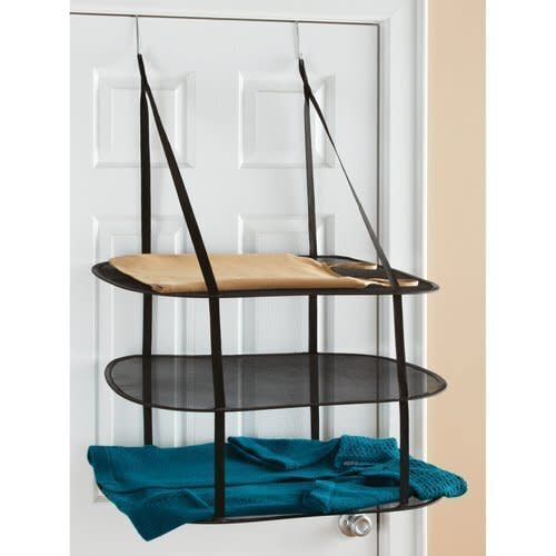 This over-the-door drying rack is ideal for drying sweaters and heavier items that you don't want to ruin on a hanger. <strong><a href="https://www.amazon.com/Greenco-Tier-Over-Door-Drying/dp/B010CBS5BC?tag=thehuffingtop-20" target="_blank" rel="noopener noreferrer">Get it on Amazon, $14</a></strong>.