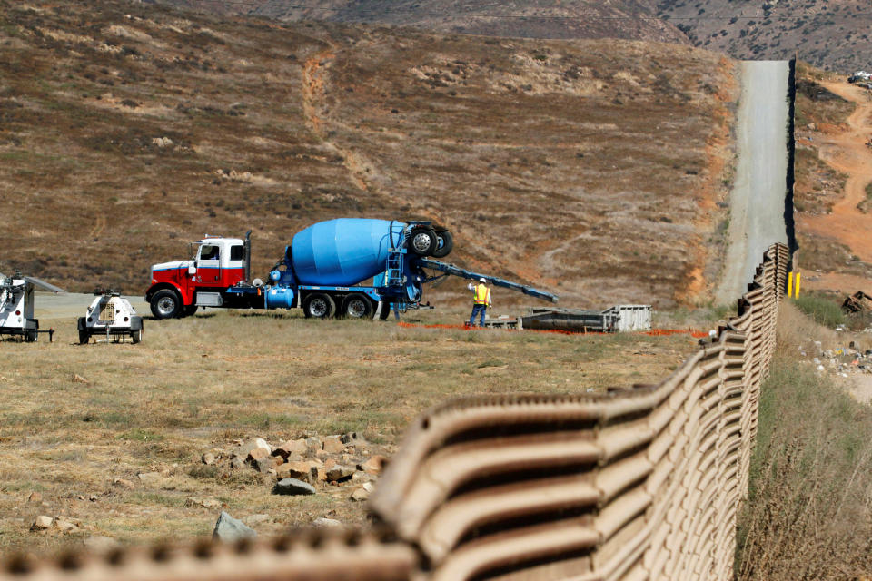 People work at the construction site of eight prototypes for President Donald Trump’s border wall with Mexico, in San Diego, California, U.S., as seen from Tijuana