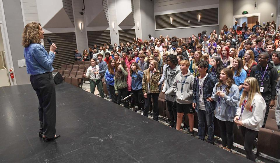 Brenda Kelley, Anderson School District Five Deputy Superintendent congratulates Southwood Academy of the Arts students at the announcement of the school winning Special School category for Palmetto's Finest Award winners for 2023, in their auditorium via SCETV telecast Wednesday, March 15, 2023. South Carolina Association of School Administrators awarded two elementary, two secondary and Southwood as the one Special School category. Woodmont High in Greenville was one of the secondary school winners.