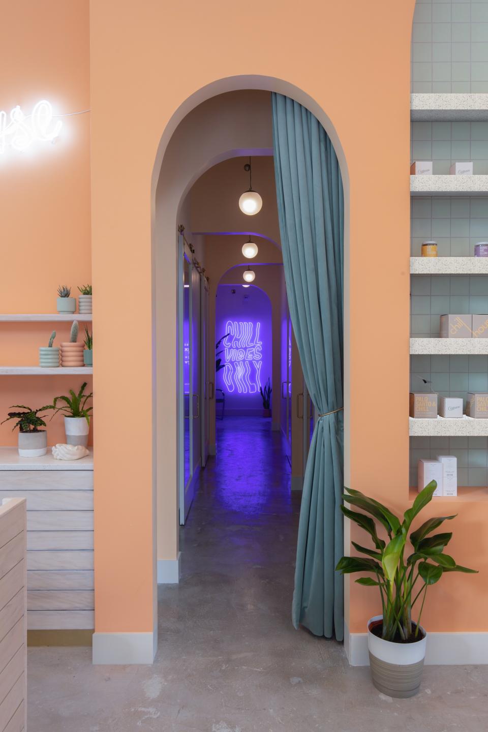 A hallway off of the entryway leads to treatment rooms for massages, facials, and an infrared sauna.