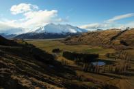 A view of rural farmland from the Southern Alps in Wanaka, New Zealand.
