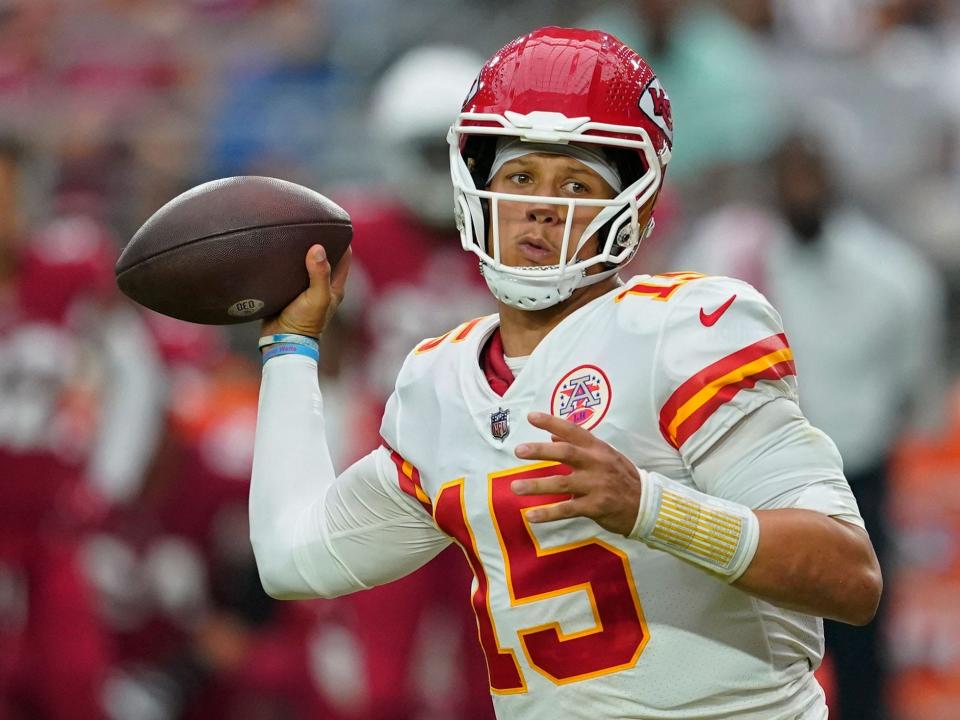 Patrick Mahomes looks to throw against the Arizona Cardinals.