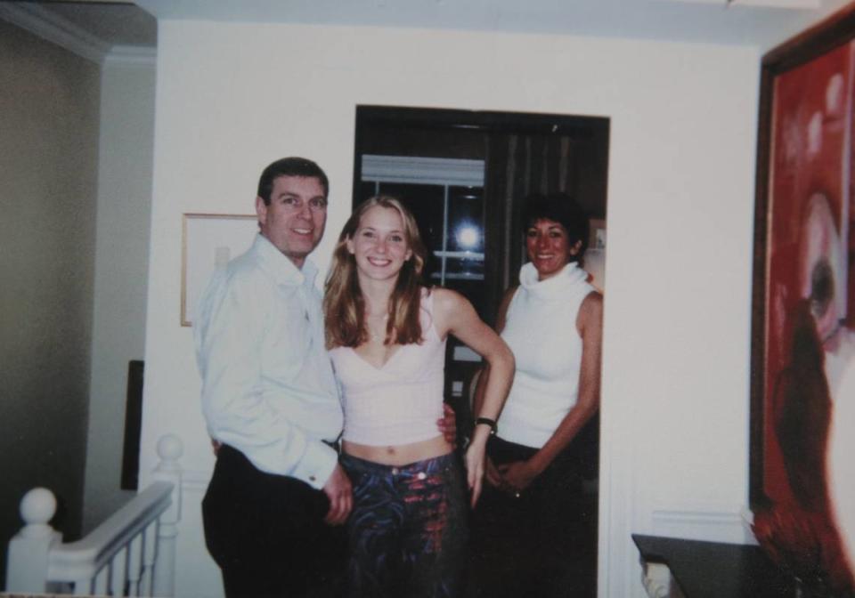 In this photograph, Virginia Giuffre socializes with Prince Andrew as Jeffrey Epstein associate Ghislaine Maxwell, who is on trial in New York for her alleged role in Epstein’s sex-trafficking operation, looks on.