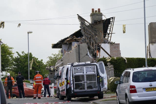 The blast destroyed three houses