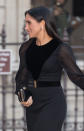 <p>Le lendemain, le 25 septembre, Meghan Markle est particulièrement apprêtée puisqu’elle porte une belle robe noire. Crédit photo : Getty Images </p>