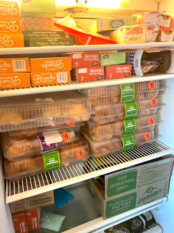 <p>Elle McLemore</p> Stocked freezer in the hotel filled with more frozen meals.