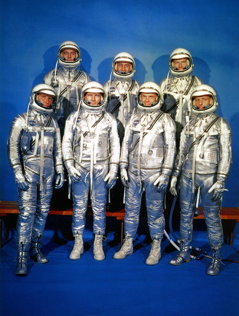 NASA's original Mercury astronauts in B.F. Goodrich silvery spacesuits. From the left: Wally Schirra, Alan Shepard, Deke Slayton, Gus Grissom, John Glenn, Gordon Cooper and Scott Carpenter. <cite>NASA</cite>