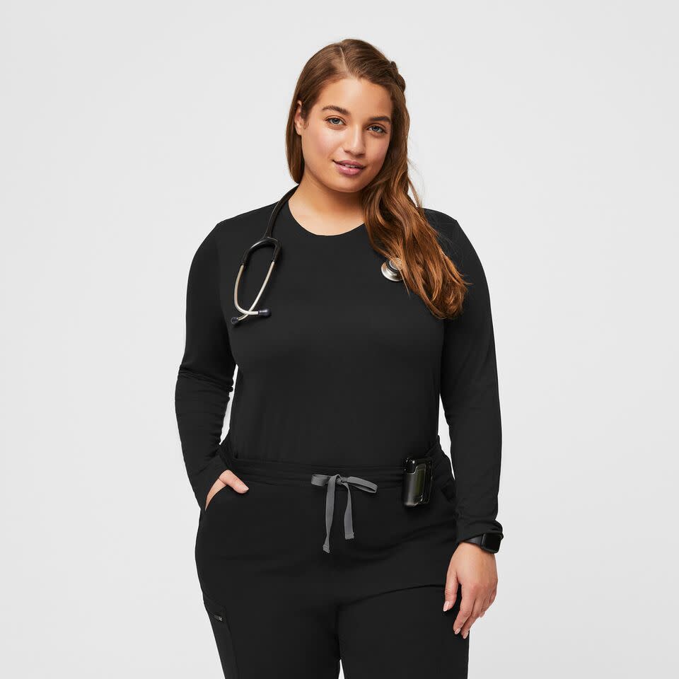 <p><a href="https://go.redirectingat.com?id=74968X1596630&url=https%3A%2F%2Fwww.wearfigs.com%2Fproducts%2Fwomens-super-soft-longsleeve-under-scrubs&sref=https%3A%2F%2F" rel="nofollow noopener" target="_blank" data-ylk="slk:Shop Now;elm:context_link;itc:0;sec:content-canvas" class="link ">Shop Now</a></p><p>Supersoft Longsleeve Underscrub</p><p>wearfigs.com</p><p>$29.90</p><span class="copyright">Figs</span>