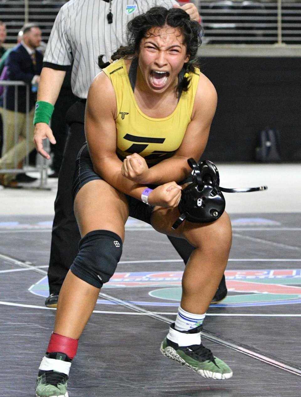 Gabriella Perez of Treasure Coast celebrates her victory over Tydaisa Mack of North Miami during the FHSAA State Wrestling Championships at Silver Spurs Arena in Kissimmee. Craig Bailey/FLORIDA TODAY via USA TODAY NETWORK