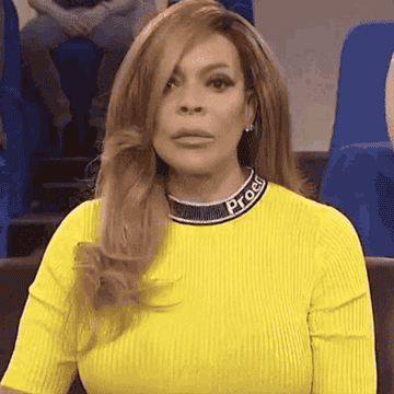 Wendy Williams turning and putting her hand under her chin