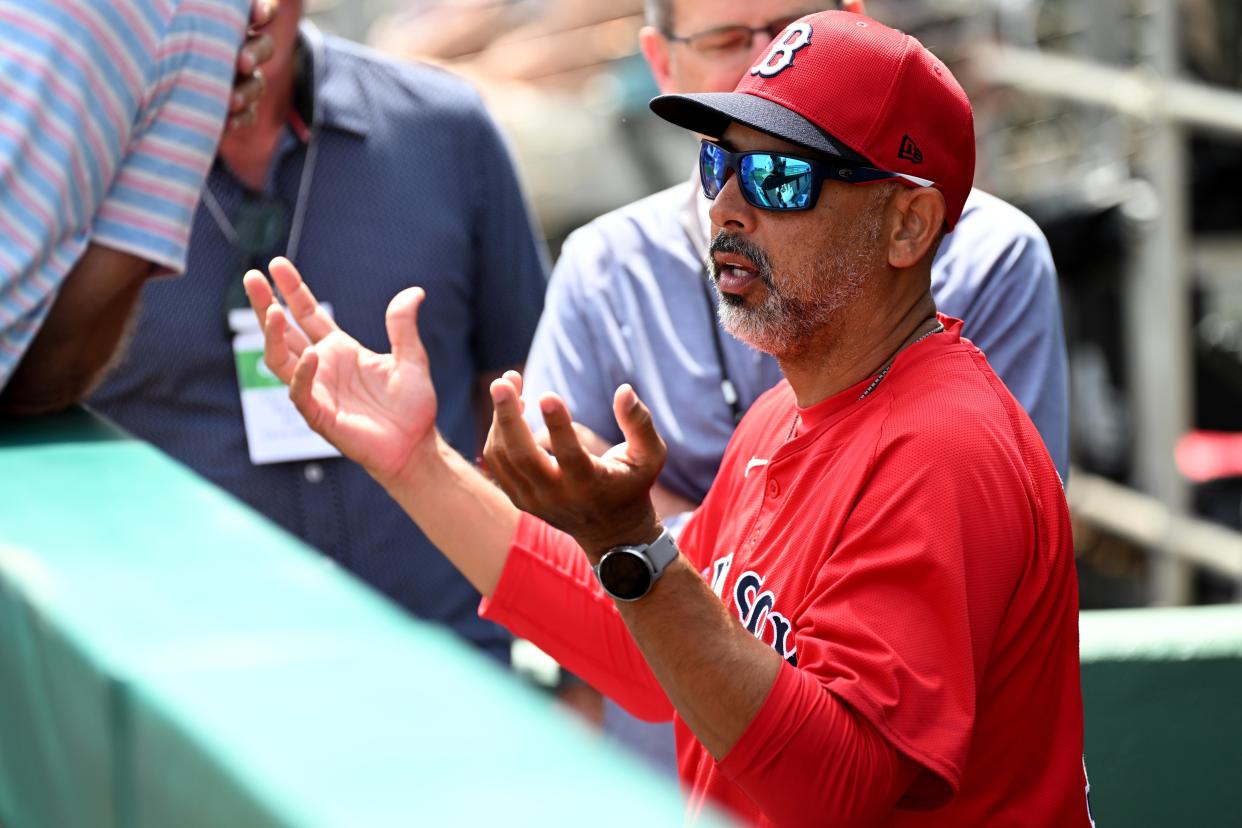Red Sox manager Alex Cora talks with reporters before the start of the spring training game against the Atlanta Braves at JetBlue Park on March 7.