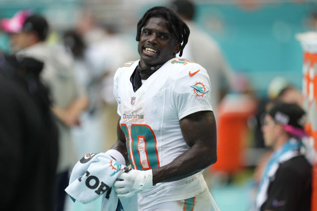 Miami Dolphins wide receiver Tyreek Hill (10) stands on the field during  the first half of an NFL football game against the New York Jets, Sunday,  Jan. 8, 2023, in Miami Gardens