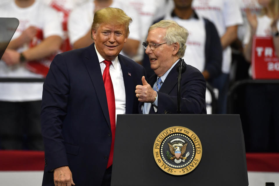 FILE - Then President Donald Trump, left, and Senate Majority Leader Mitch McConnell of Ky., greet each other during a campaign rally in Lexington, Ky., Nov. 4, 2019. McConnell has endorsed Donald Trump for president. McConnell announced his decision after Super Tuesday wins pushed Trump, who is the GOP front-runner, closer to the party nomination. It’s a remarkable turnaround for McConnell, who has blamed Trump for “disgraceful” acts in the Jan. 6, 2021, attack on the Capitol. (AP Photo/Timothy D. Easley, File)