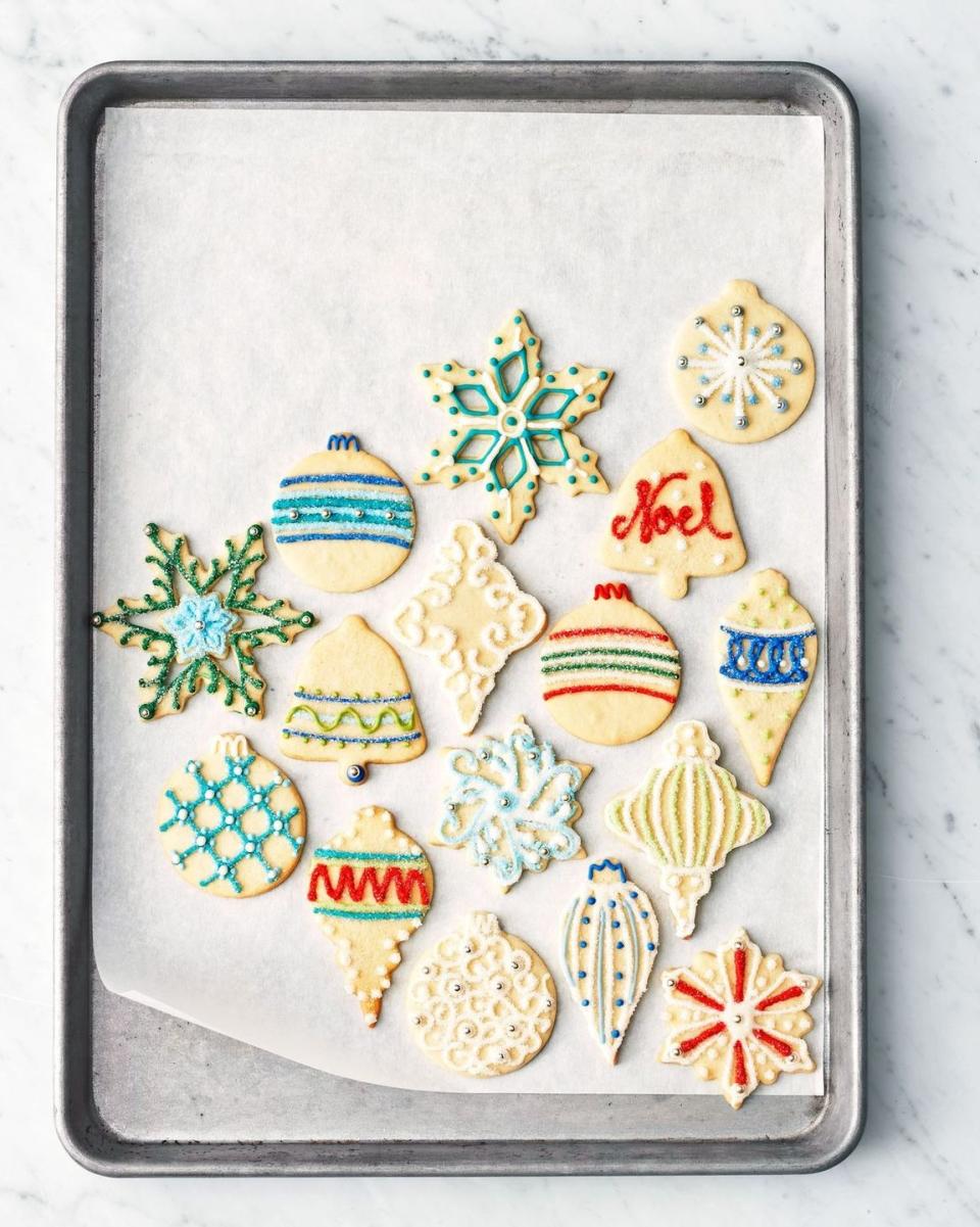 <p>Simple sugar cookies get a glamorous upgrade, thanks to ornament-shaped cutters and colorful icing.</p><p><strong><a href="https://www.countryliving.com/food-drinks/recipes/a3270/sugar-cookies-recipe/" rel="nofollow noopener" target="_blank" data-ylk="slk:Get the recipe for Sugar Cookies;elm:context_link;itc:0;sec:content-canvas" class="link ">Get the recipe for Sugar Cookies</a>.</strong></p>