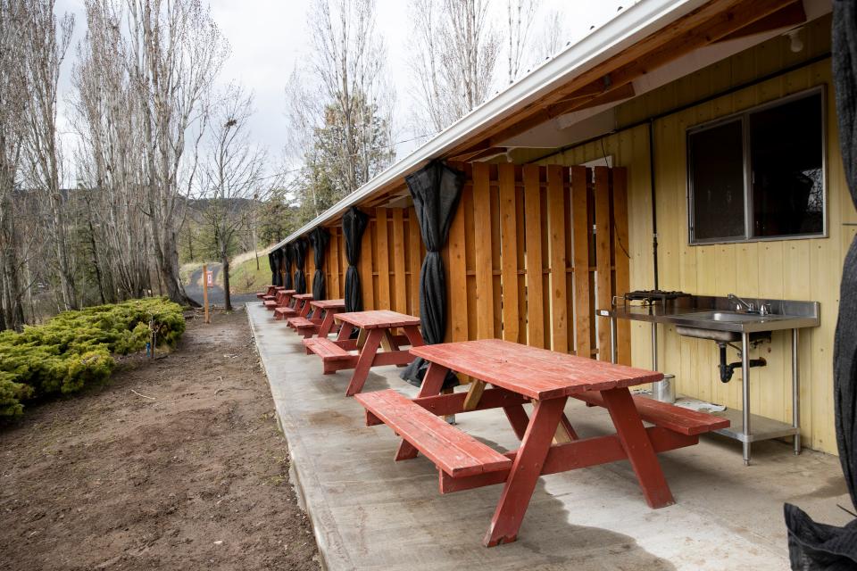 The Cramer Camp at Orchard View Farms in The Dalles employs about 1,600 workers during cherry picking season. Some of the housing units, such as these, have outdoor kitchens under a covered porch.