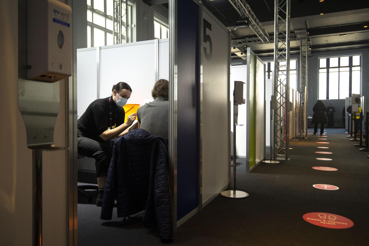 A man receives an injection of Covid-19 vaccine at the Science Museum in London (Victoria Jones/PA) (PA Wire)