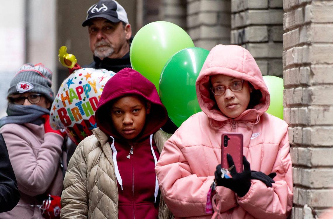 People attend a vigil for Grayson O’Connor on Wednesday, Dec. 27, 2023, in Kansas City. The 5-year-old boy was found dead in an alleyway outside of his downtown Kansas City apartment.