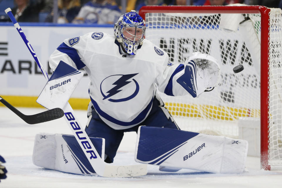 Tampa Bay Lightning goalie Andrei Vasilevskiy watches the puck during the third period of the team's NHL hockey game against the Buffalo Sabres, Tuesday, Dec. 31, 2019, in Buffalo, N.Y. (AP Photo/Jeffrey T. Barnes)