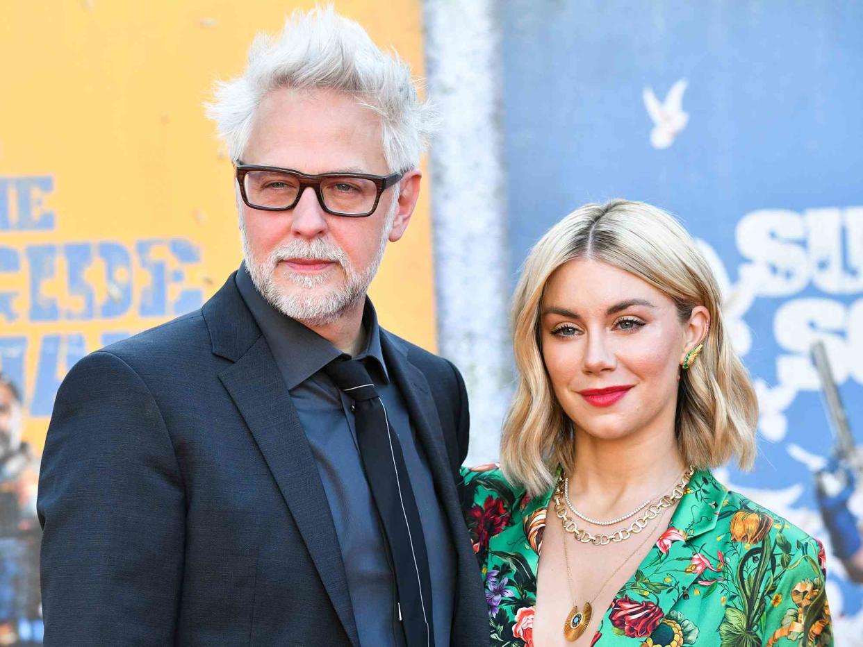 <p>Rodin Eckenroth/WireImage</p> James Gunn and Jennifer Holland attend a movie premiere in 2021